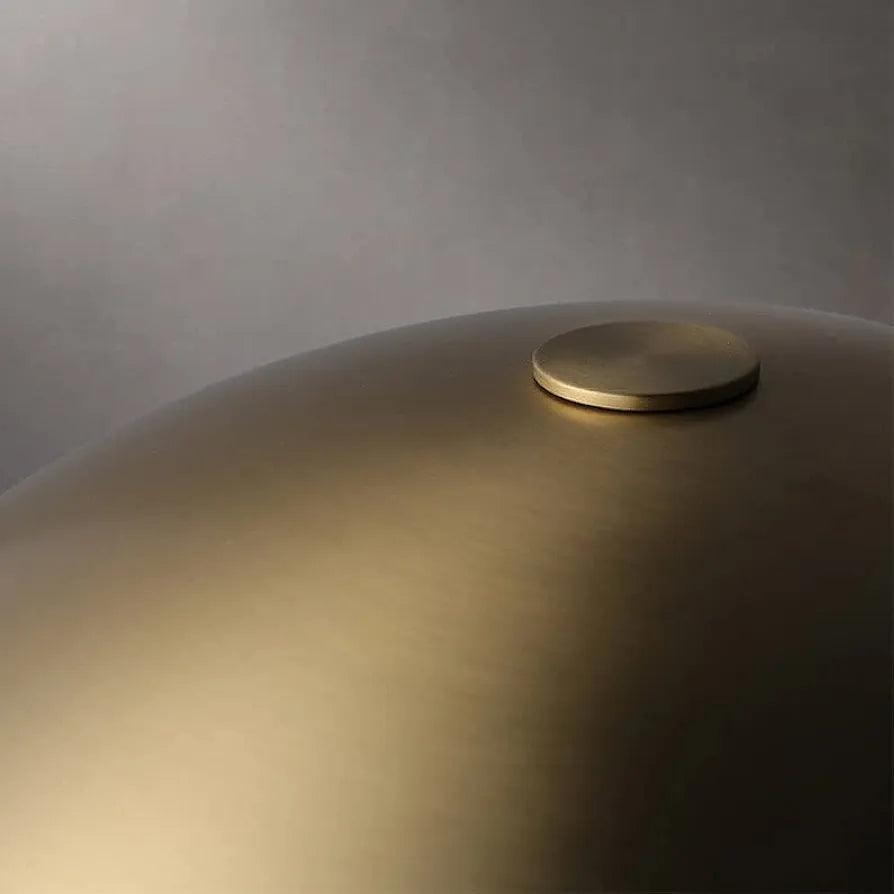 Close-up of dome top – reflective metallic texture and smooth curve