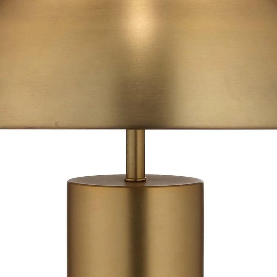 Mid-section close-up – gold stem and smooth metal finish