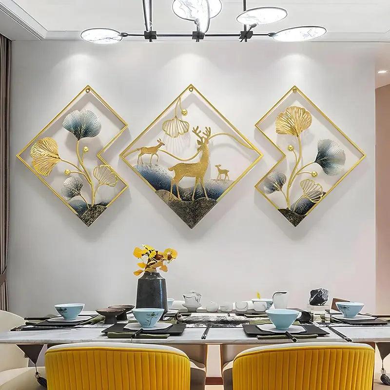 Aesthetic metal wall art featuring golden deer and floral designs in a modern dining room setting