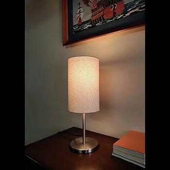 Elegant N I CREATIONS bedside table lamp with a white fabric shade and sleek metal base for cozy ambiance