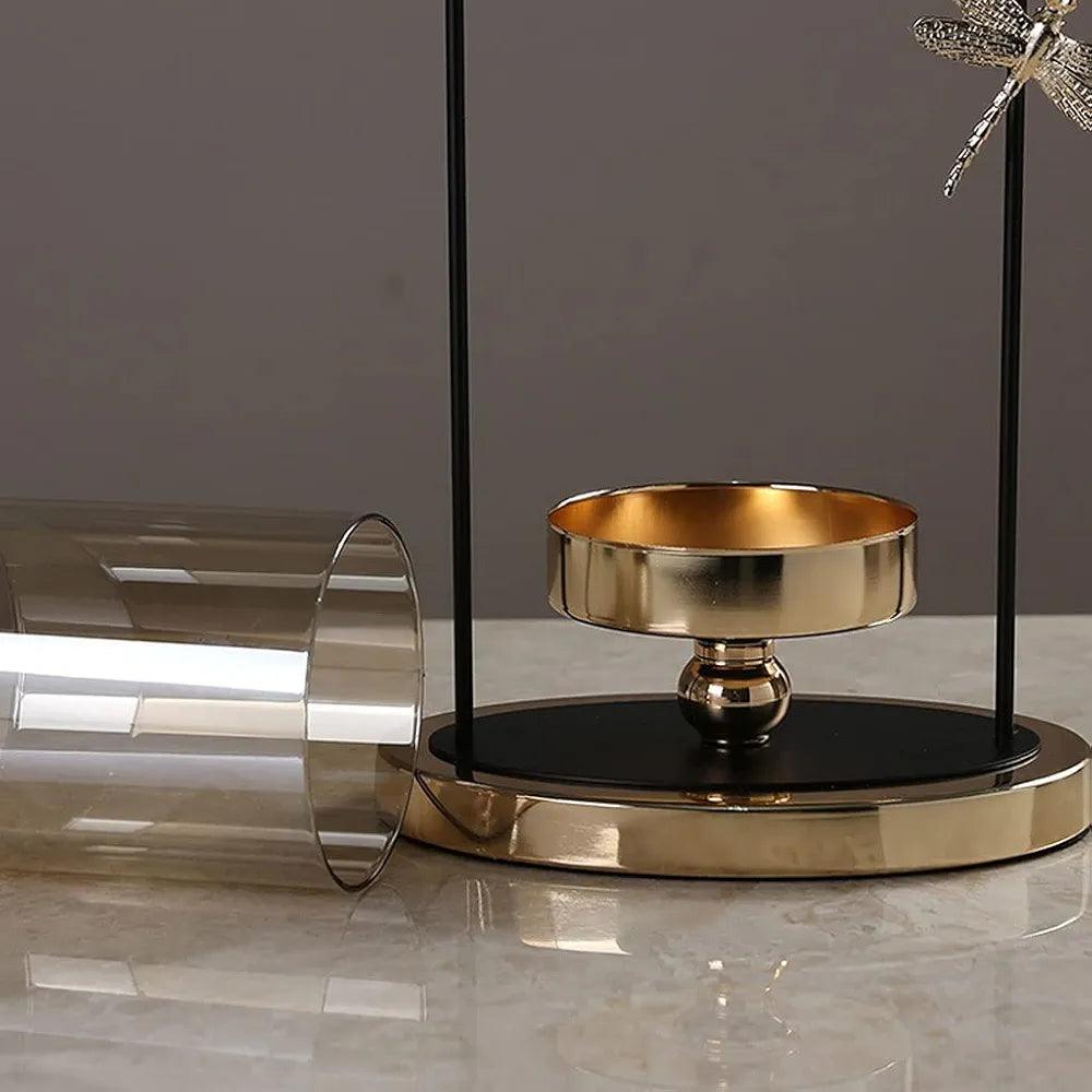 Elegant N I CREATIONS candlestick holder pillar with a gold finish and decorative design