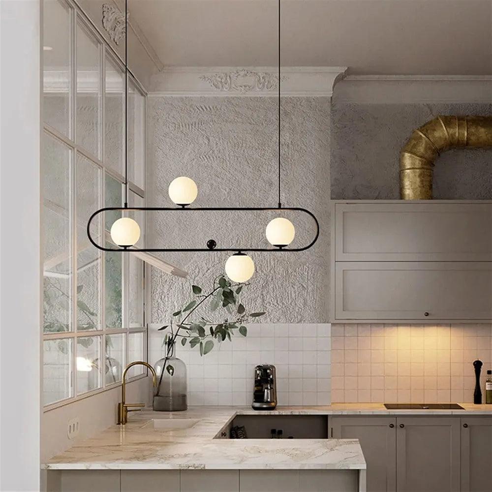 Stylish N I CREATIONS chandelier pendant light in modern kitchen with elegant design and round glass bulbs