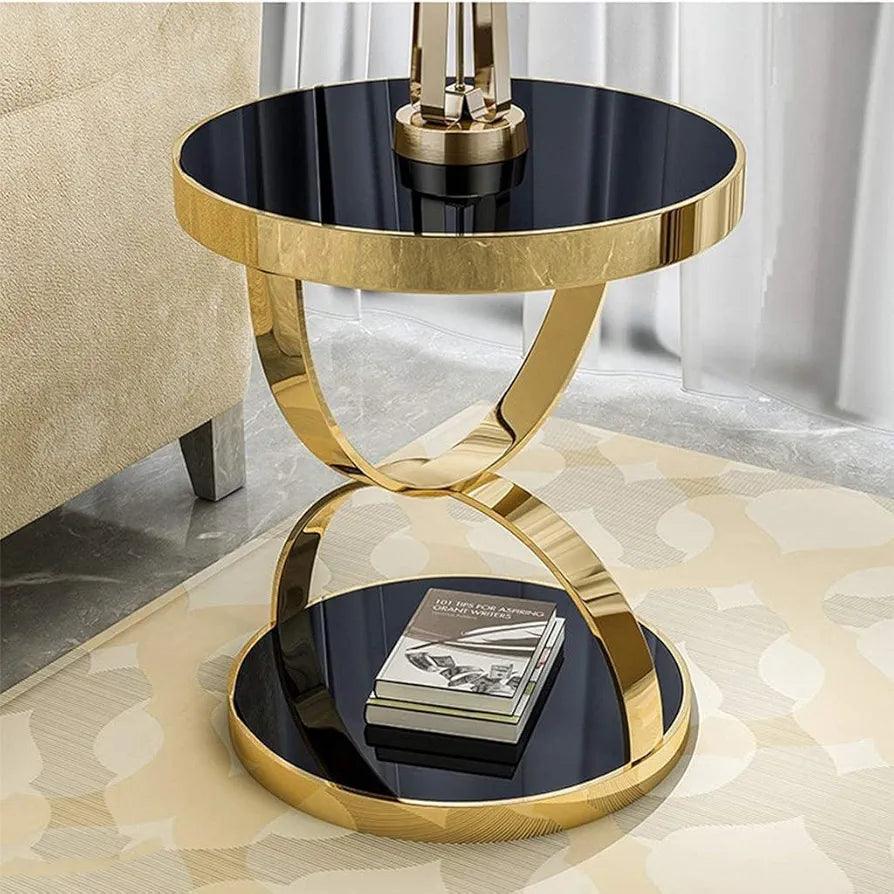 Elegant N I CREATIONS coffee table with a glossy black top and gold metal base for modern home decor
