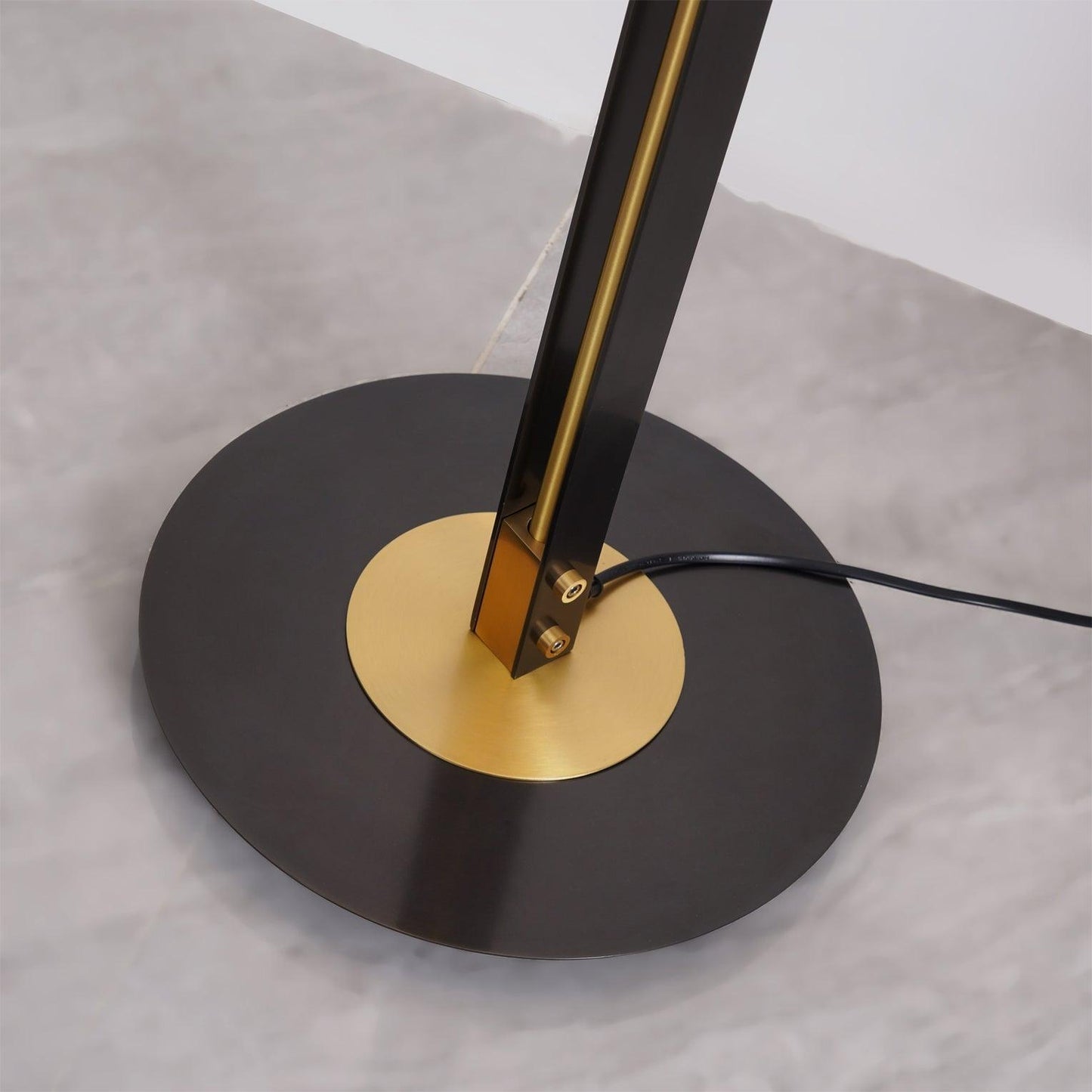 Elegant N I CREATIONS floor lamp with a sleek black and gold base for modern home decor