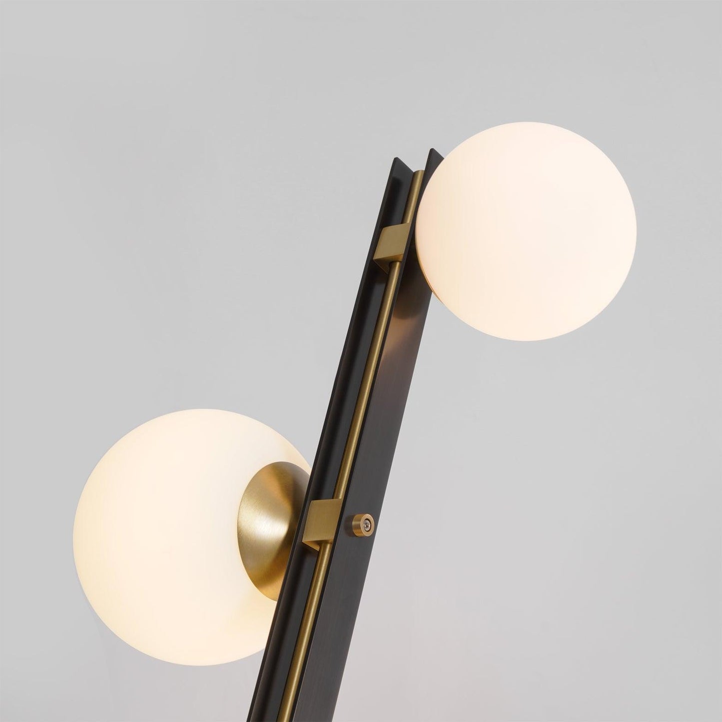 Modern N I CREATIONS floor lamp with two spherical glass shades and sleek black design