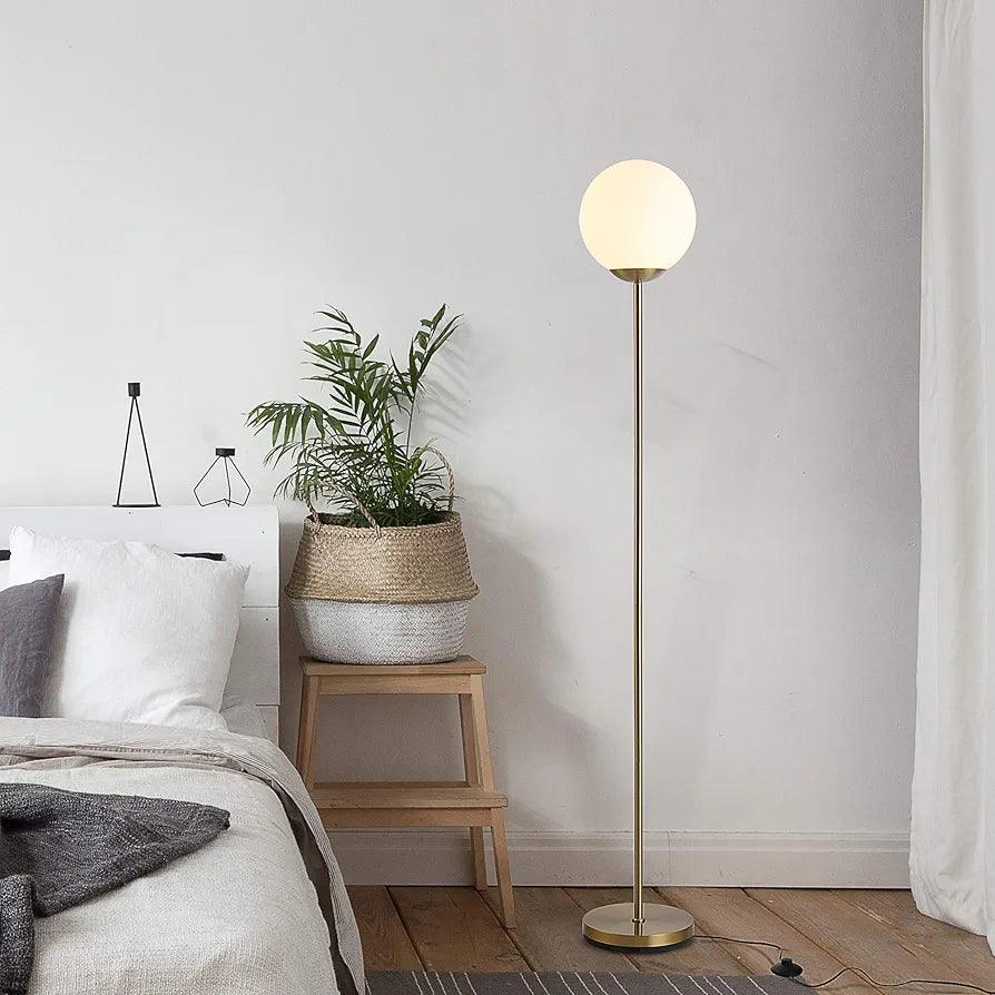 N I CREATIONS modern floor lamp standing with a round white shade, enhancing home decor