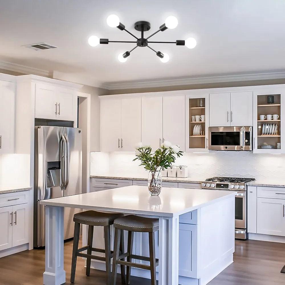Modern kitchen with stylish Hanging Lights illuminating a spacious island and sleek cabinetry