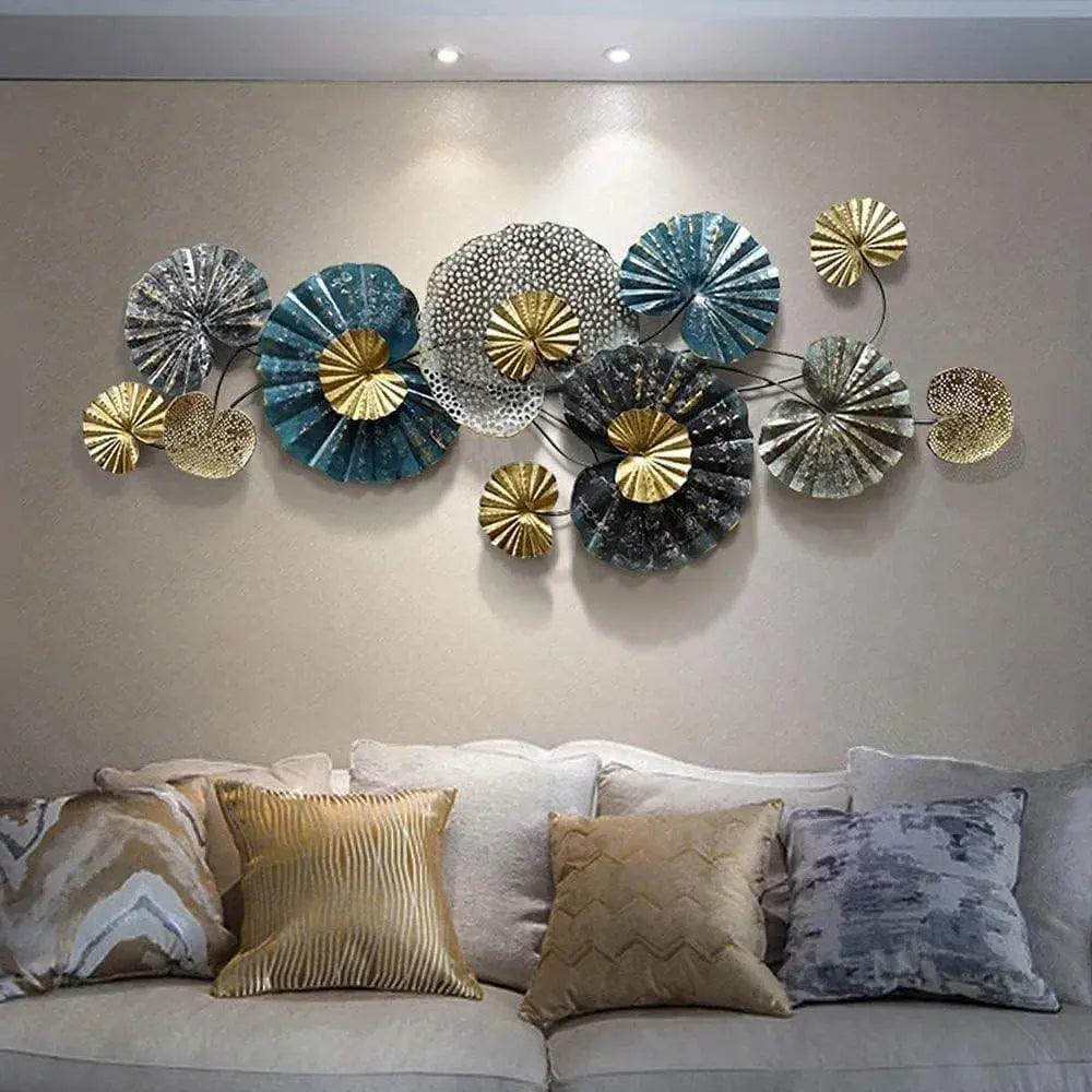 Decorative metal lotus wall art in various colors and textures, enhancing modern living room decor