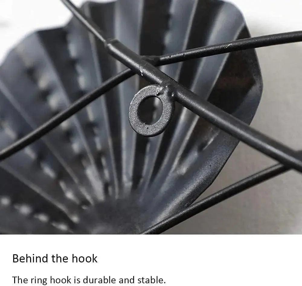 Close-up of the durable hook of metal lotus wall art by N I CREATIONS showcasing its sturdy design