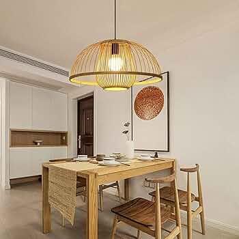 Stylish dining area featuring a N I CREATIONS modern chandelier lamp above a wooden dining table