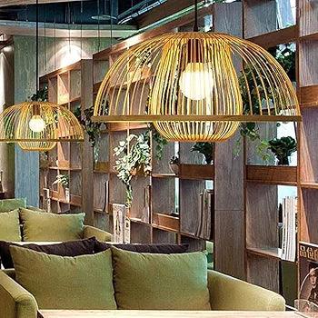Stylish N I CREATIONS modern chandelier lamp illuminating a cozy cafe space with green seating