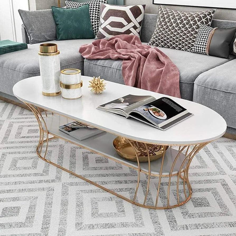 Stylish N I CREATIONS coffee table with gold accents and white top, perfect for modern home decor