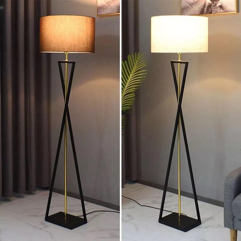 Stylish modern floor lamp with a sleek black and gold design featuring a warm brown shade