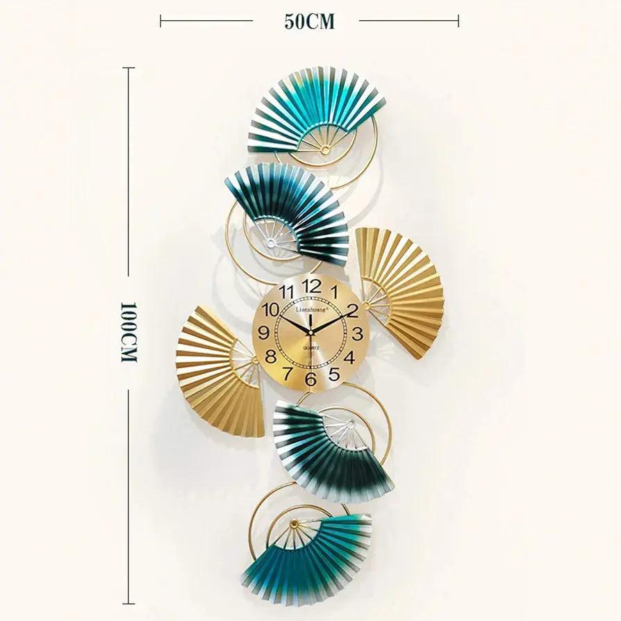Stylish modern wall clock for living room with a unique fan design in gold and teal colors