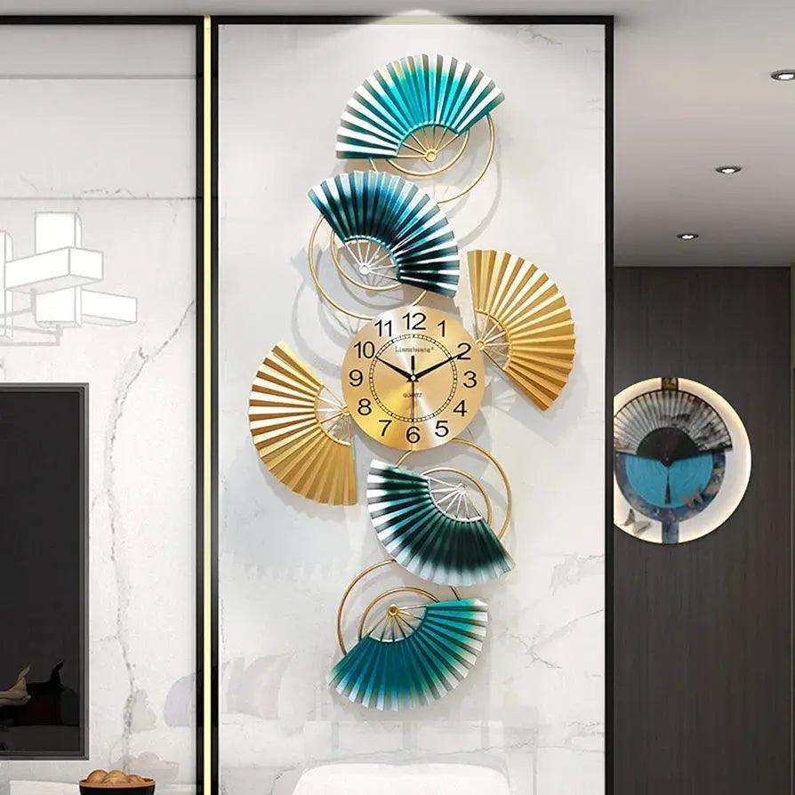 Stylish modern wall clock for living room featuring decorative fan shapes in teal and gold