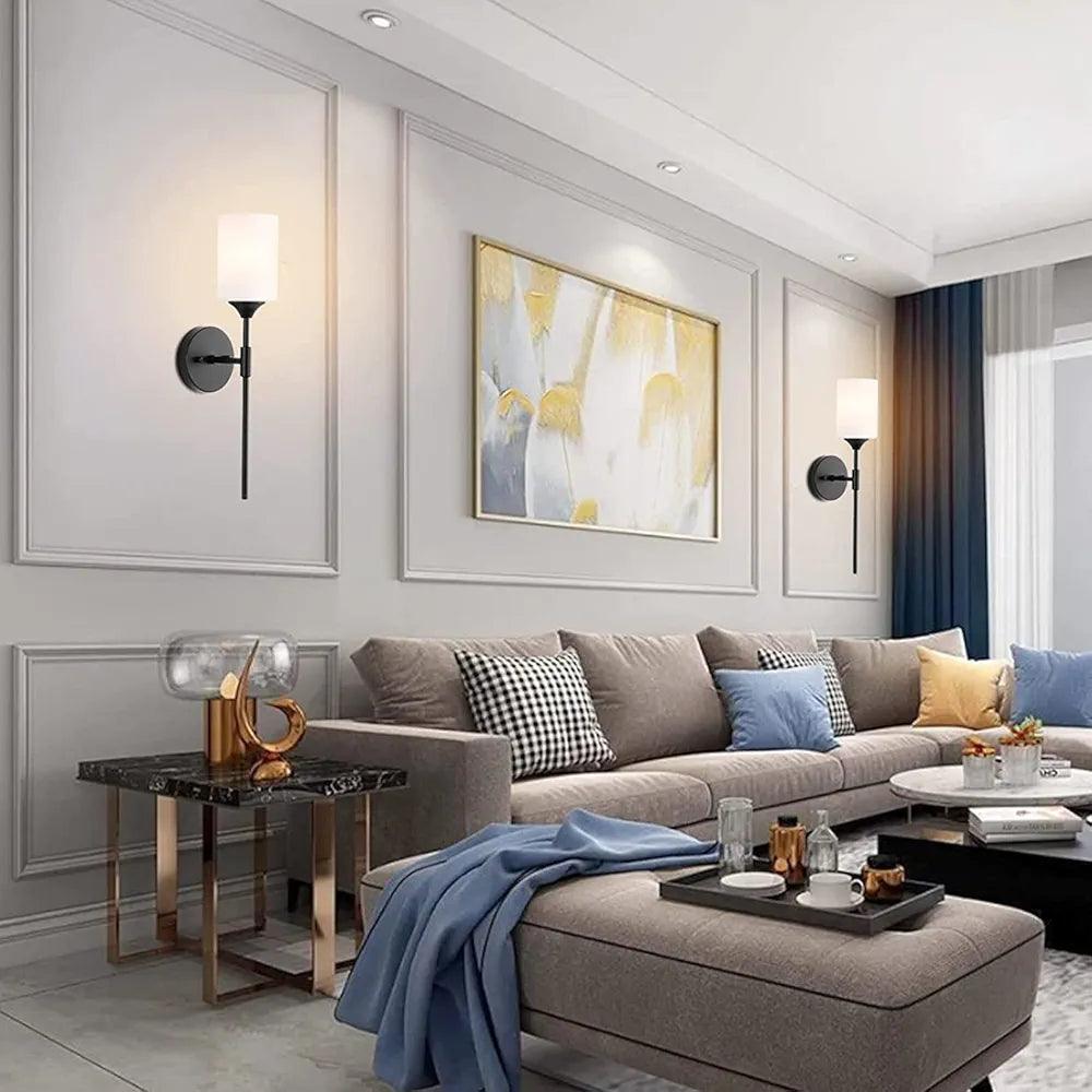Elegant N I CREATIONS wall light fixtures illuminating a modern living room with stylish decor