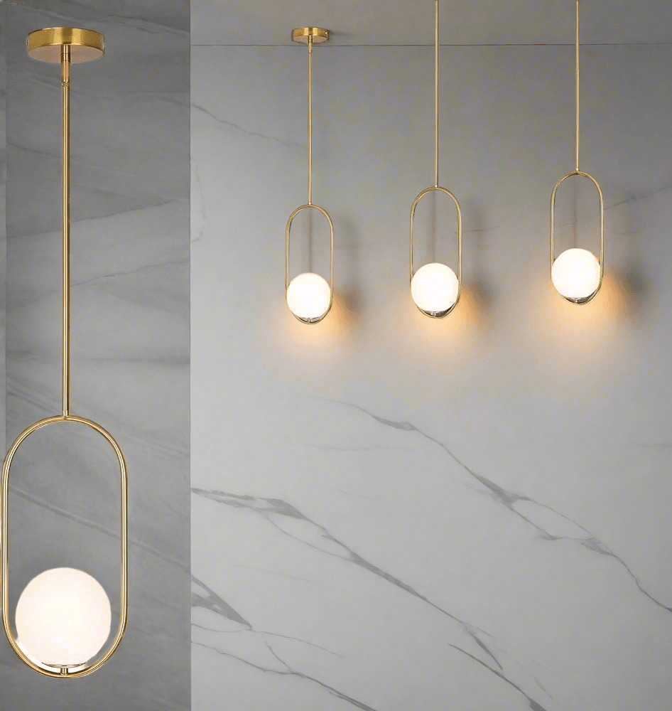 Elegant N I CREATIONS pendant light trio with spherical glass bulbs and gold frames for modern decor