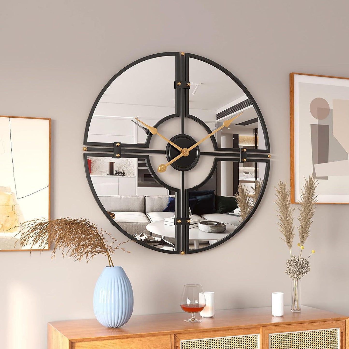 Mirror wall clock displayed on plain wall with soft lighting