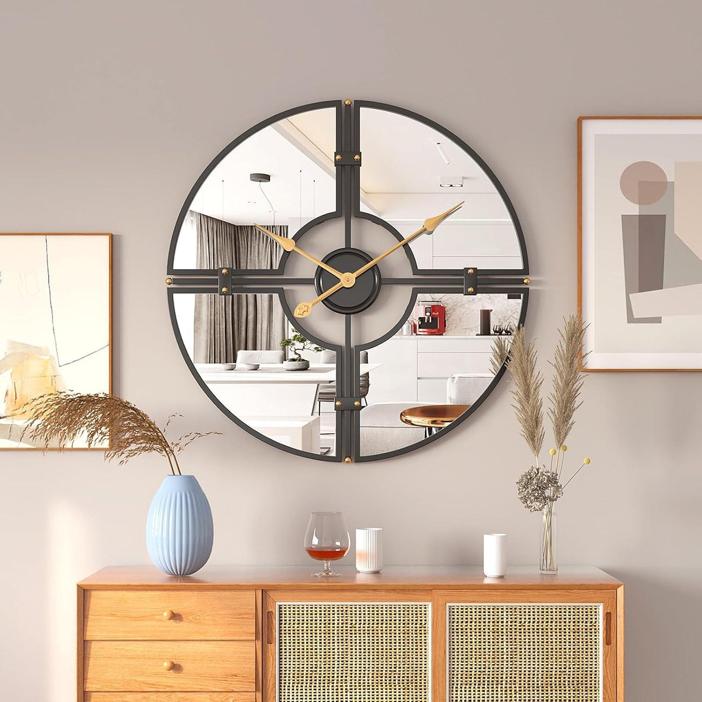 Wall clock placed above console table with styling accessories