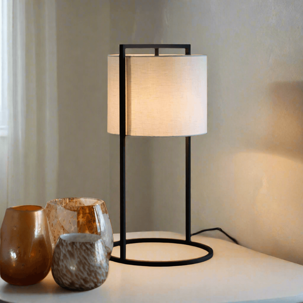 N I CREATIONS stylish table lamp with a minimalistic design and soft beige shade on a modern base