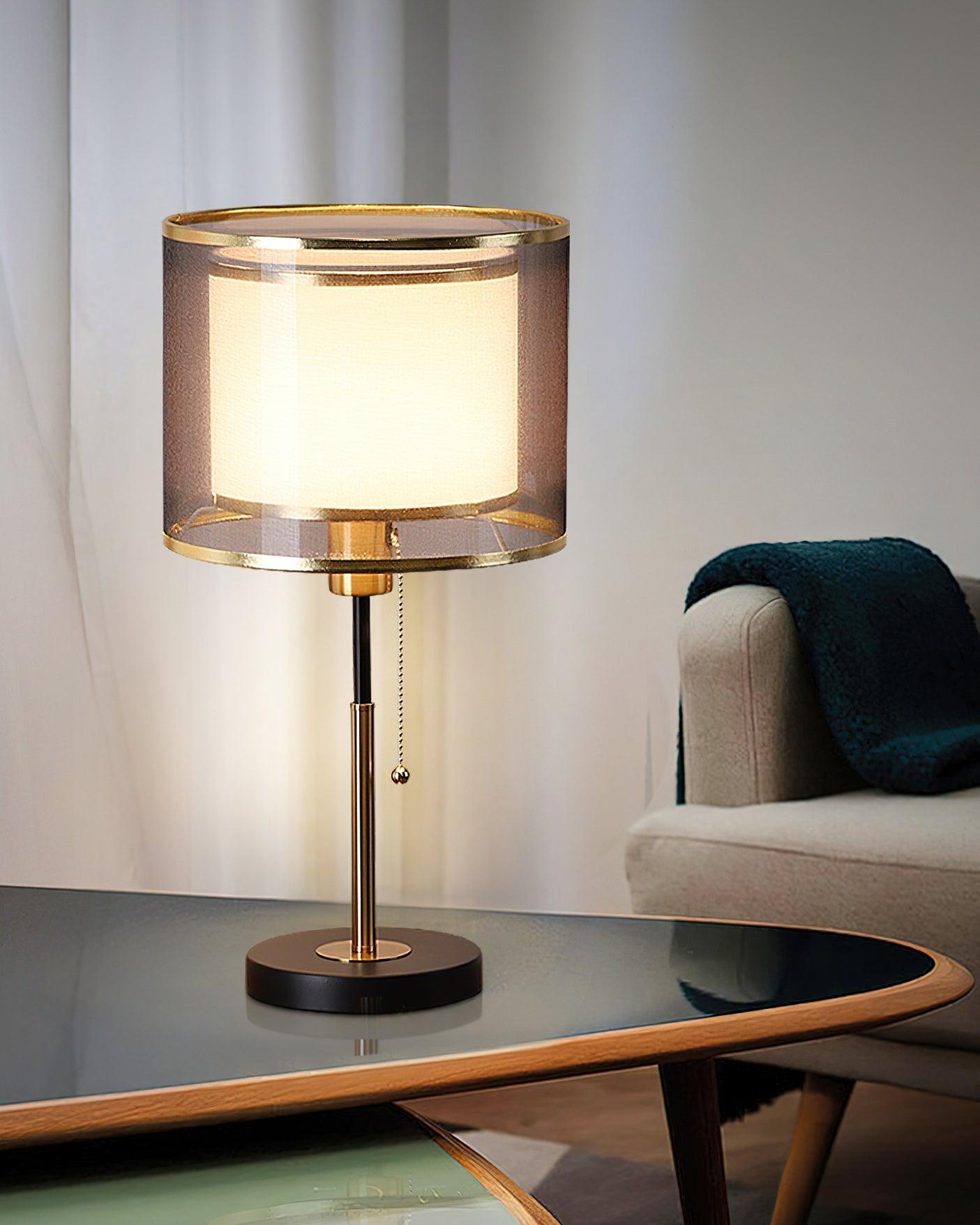 Stylish N I CREATIONS table lamp with a gold finish and modern design for home decoration