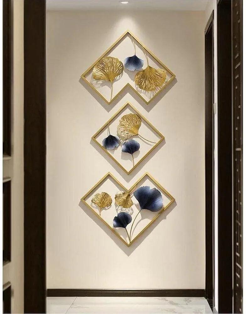 Elegant gold and blue floral wall art displayed in a modern hallway setting