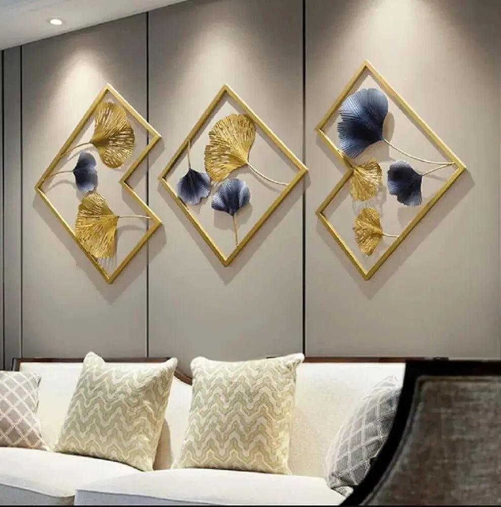 Elegant wall art featuring gold and blue leaf designs in diamond frames for stylish home decor