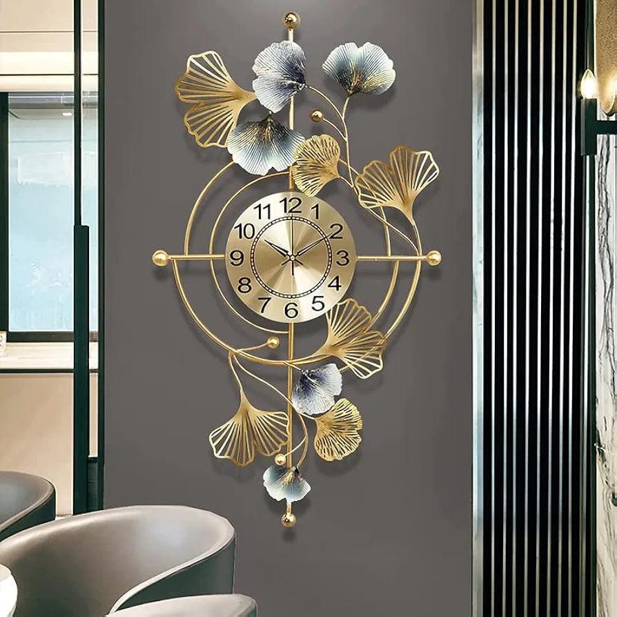 Elegant gold wall clock designed with floral ginkgo motifs for stylish home decor