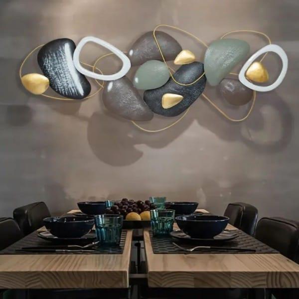 Multicolor metal art piece displayed on dining room wall – lacquer finish