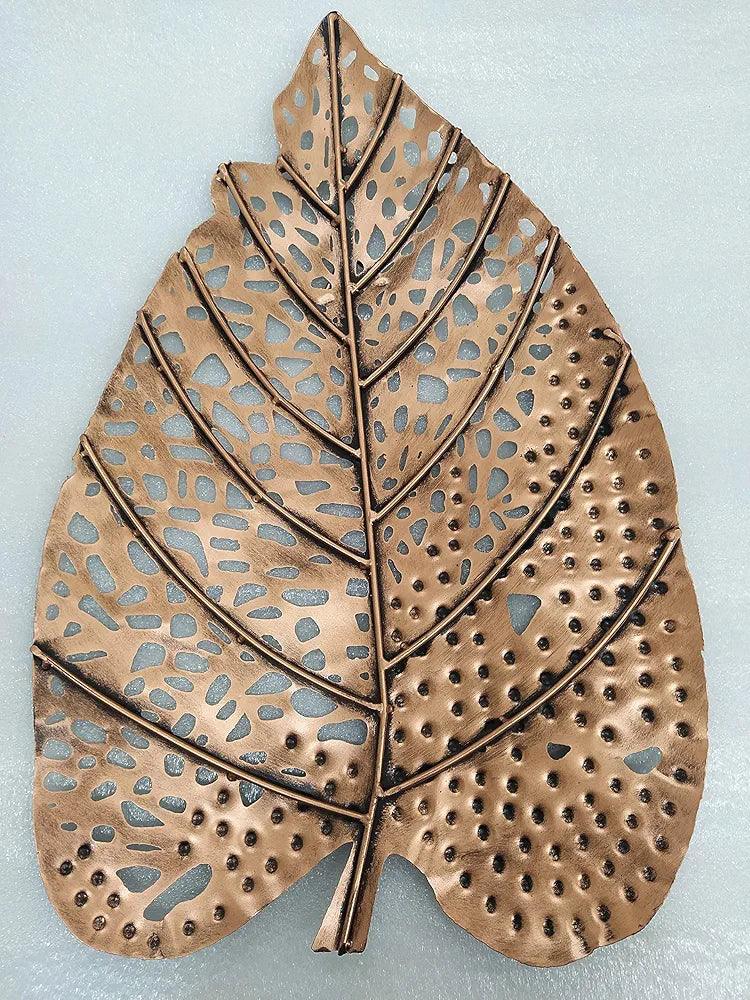 Elegant bronze wall decor leaf with intricate cut-out designs for stylish home decoration
