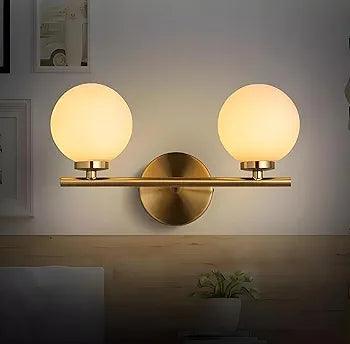 Clean product view with gold-finish body and glass shade