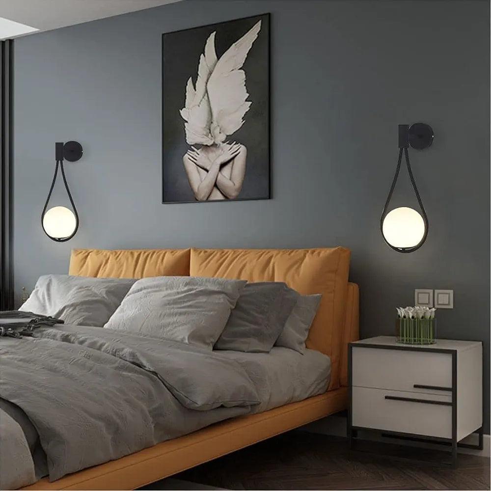 Modern N I CREATIONS wall lamp with elegant design complementing a stylish bedroom decor