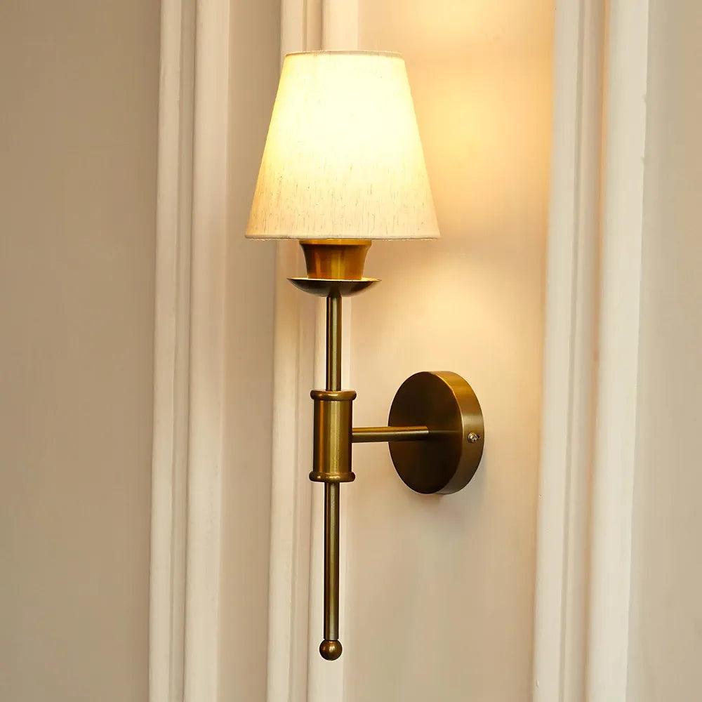 Wall lamp with soft light on in a warm setting