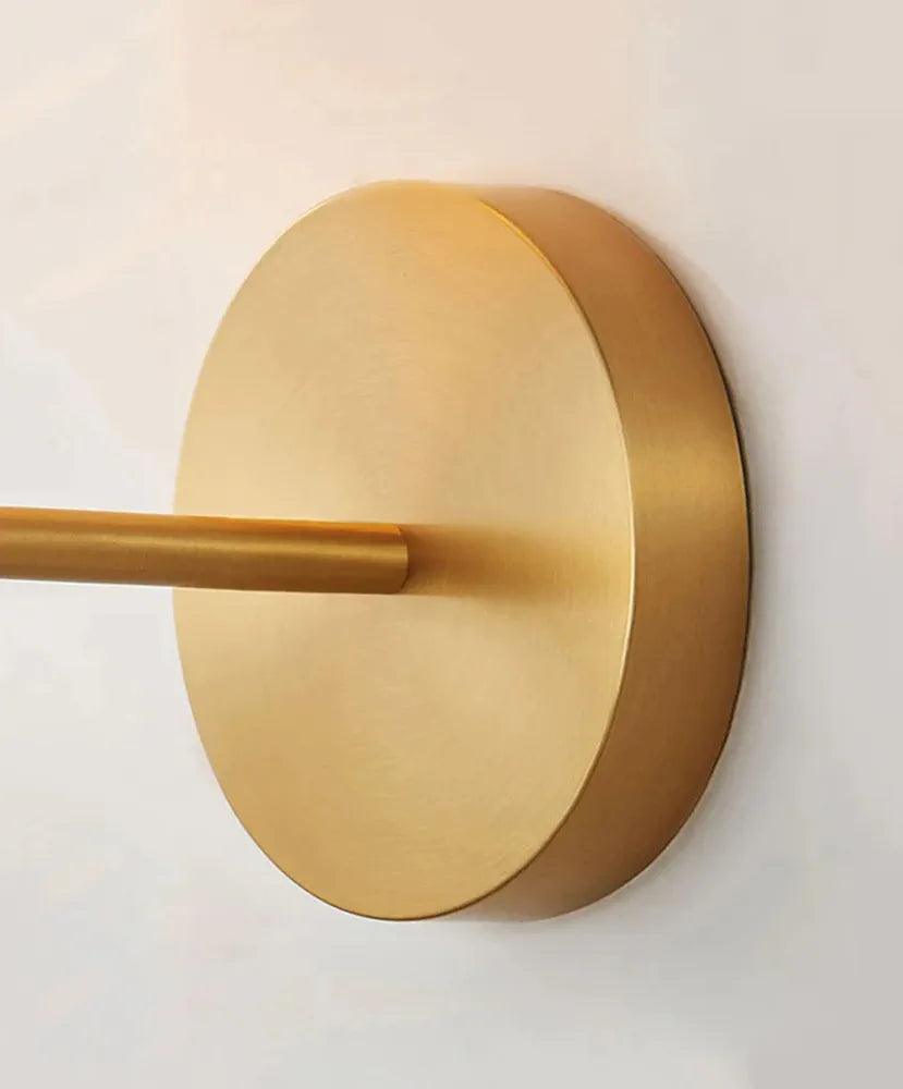 Minimalist N I CREATIONS wall lamp in a sleek gold finish, perfect for modern home decor