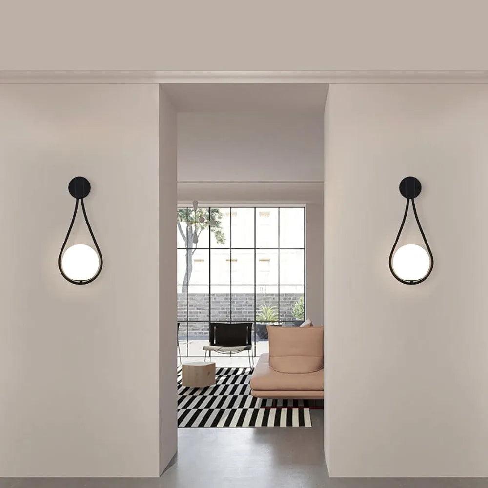 Stylish N I CREATIONS wall lamp featuring a modern drop design, perfect for home decor