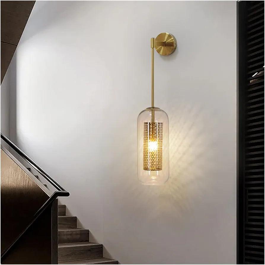 N I CREATIONS Wall light lamp with a sleek gold design illuminating a modern staircase