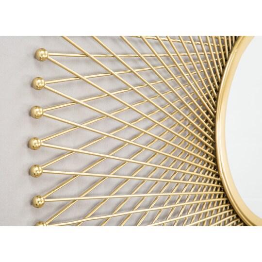 Close-up zoom of golden metal frame and mirror edge