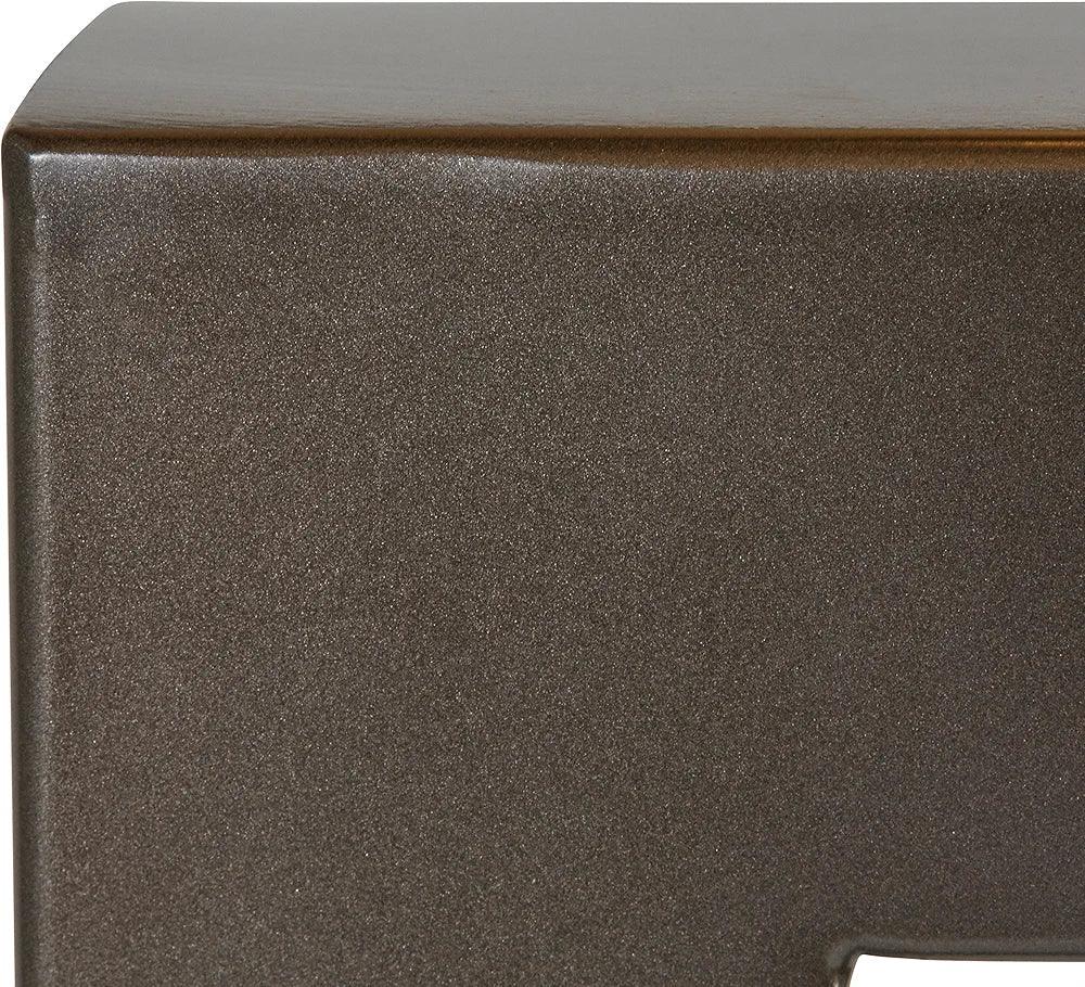 Close-up of laser-cut iron body showing metallic texture and fine detailing