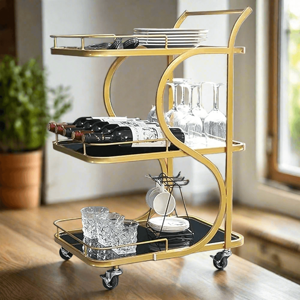 1. Gold metal bar trolley with black marble-finish trays – styled in a kitchen with blurred background
