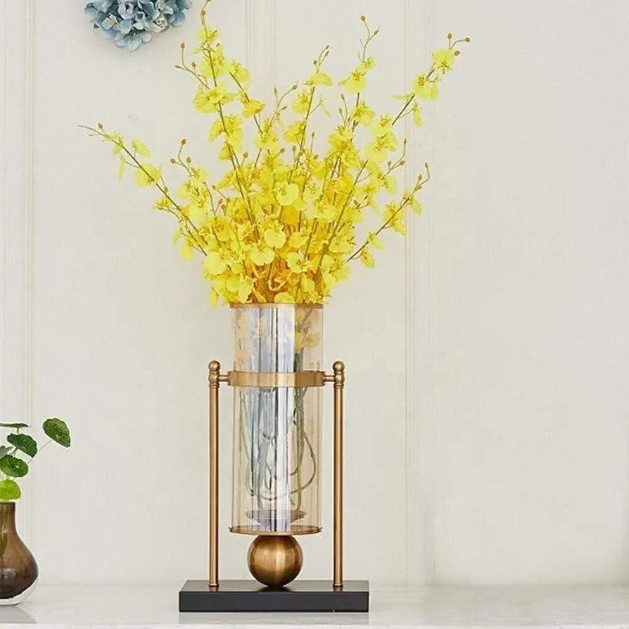 Elegant N I CREATIONS candle holder featuring a glass vase and gold accents for home decor