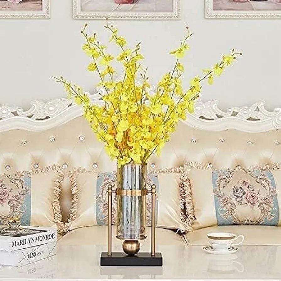 Elegant N I CREATIONS candle holder with decorative flowers on a stylish living room table