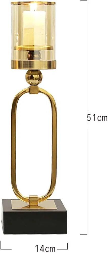 Elegant N I CREATIONS candle light holder with a gold finish and glass shade, perfect for home decor