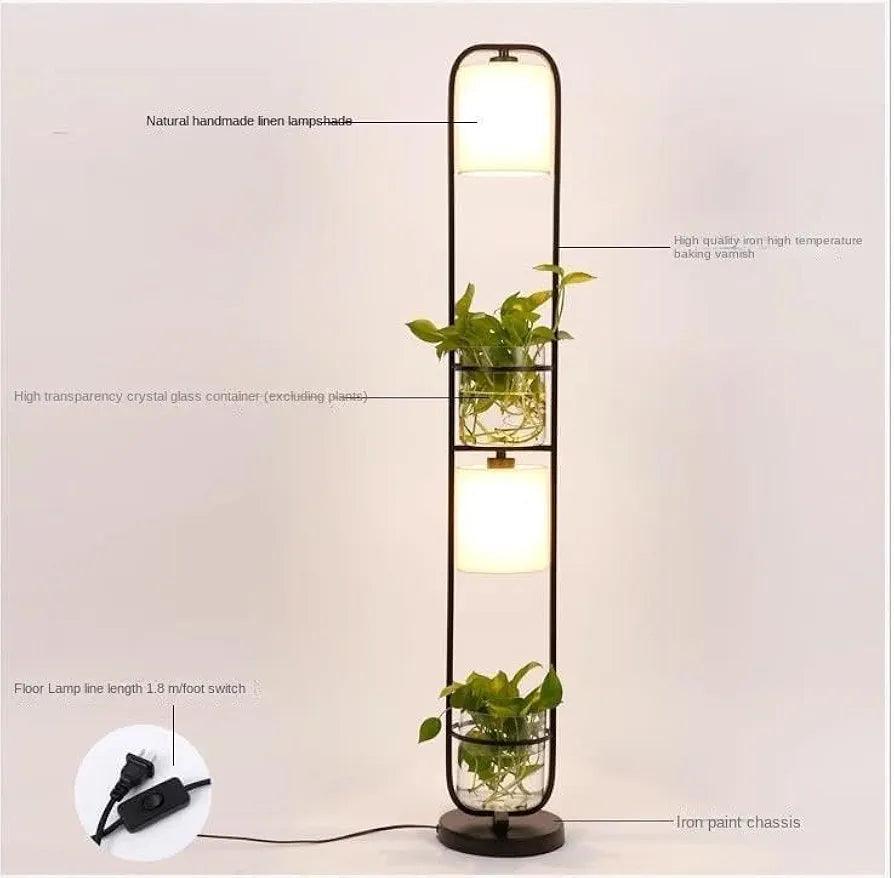 Close-up view highlighting the premium iron frame, round metal planter rings, elegant fabric shades, and clear glass plant pots.