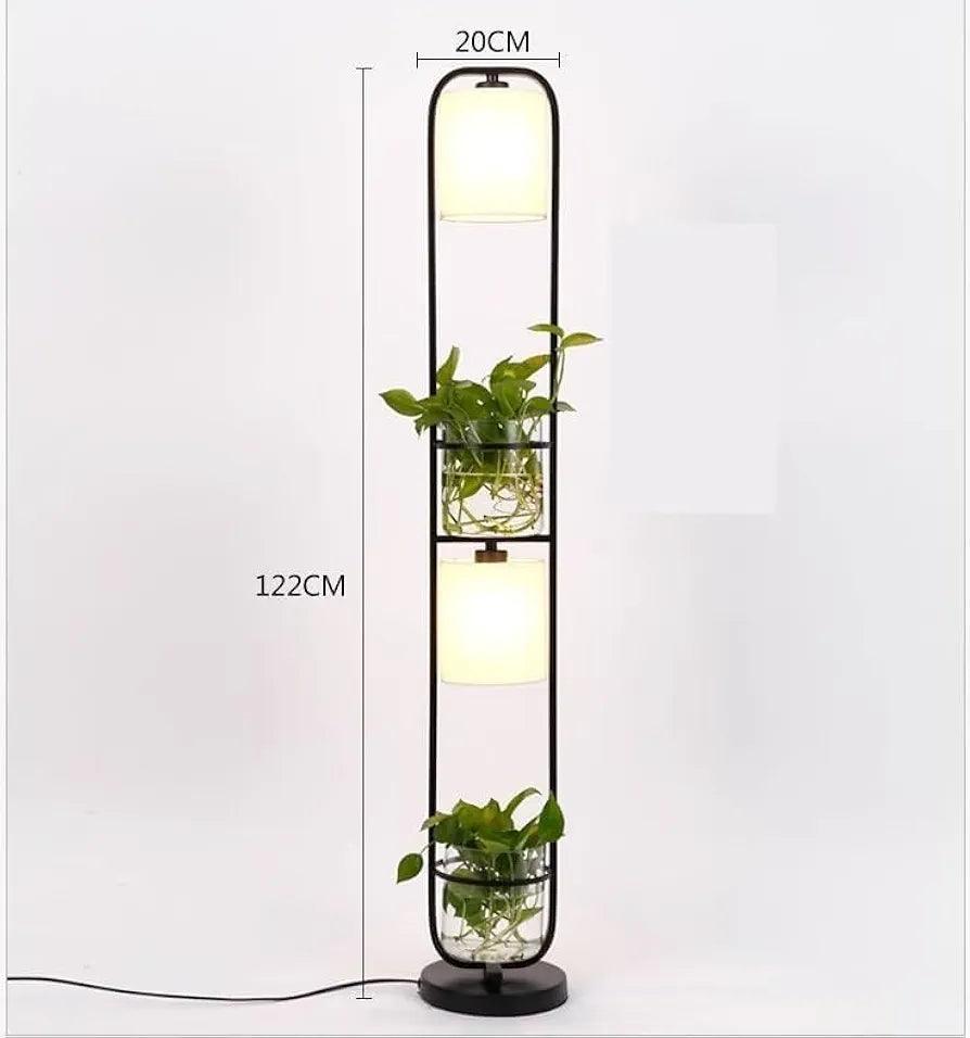 Detailed dimensions of the unique standing floor lamp with two light heads and attached plant holders.