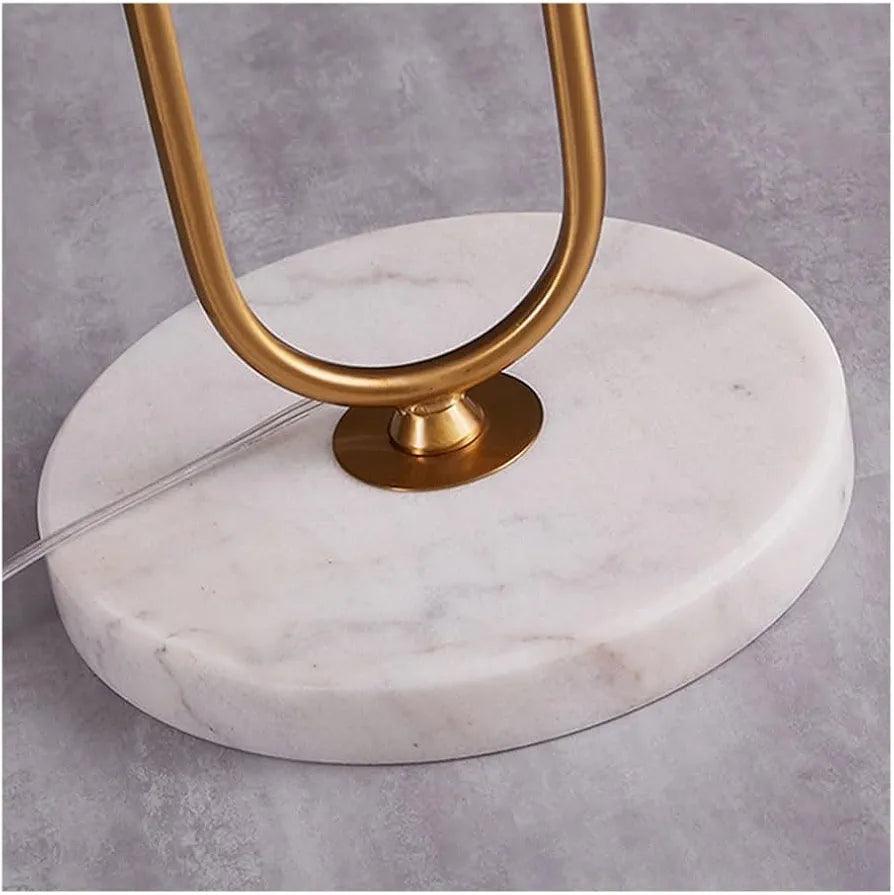 Elegant floor lamp standing with a marble base and a modern design for home decor