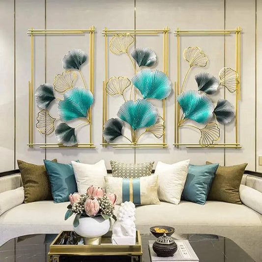 Elegant iron wall sculpture featuring blue and gold botanical design, enhancing modern home decor