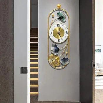 Elegant metal wall clock with floral design and gold accents for stylish home decor