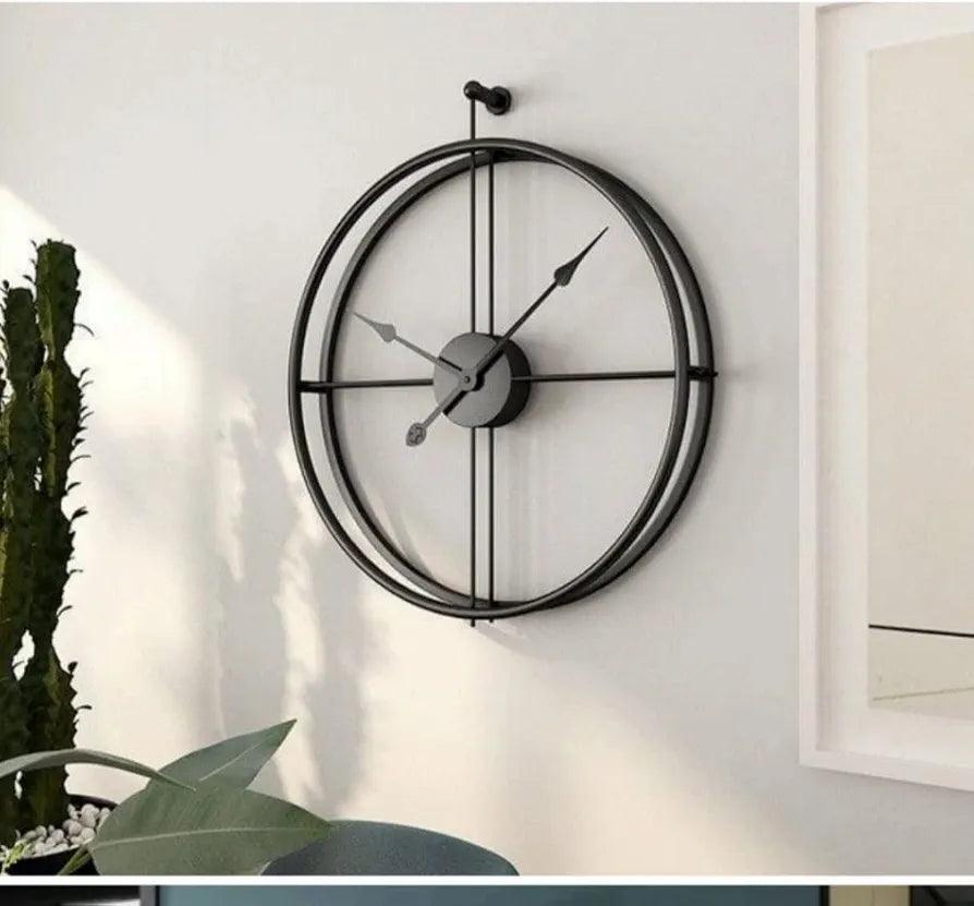 N I CREATIONS metal wall clock with a sleek design, perfect for modern home decor