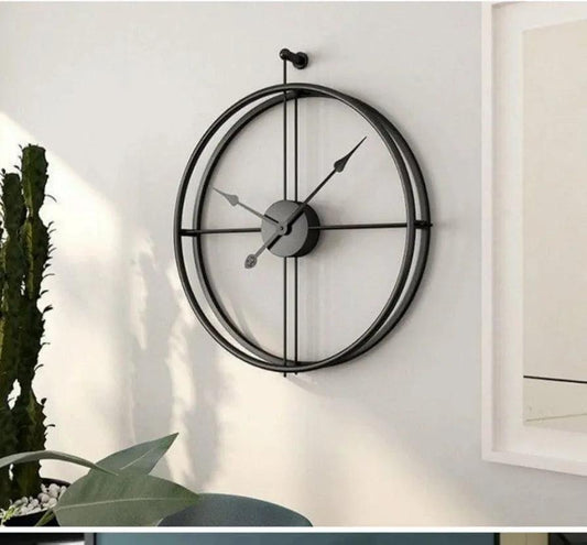 N I CREATIONS metal wall clock with a sleek design, perfect for modern home decor