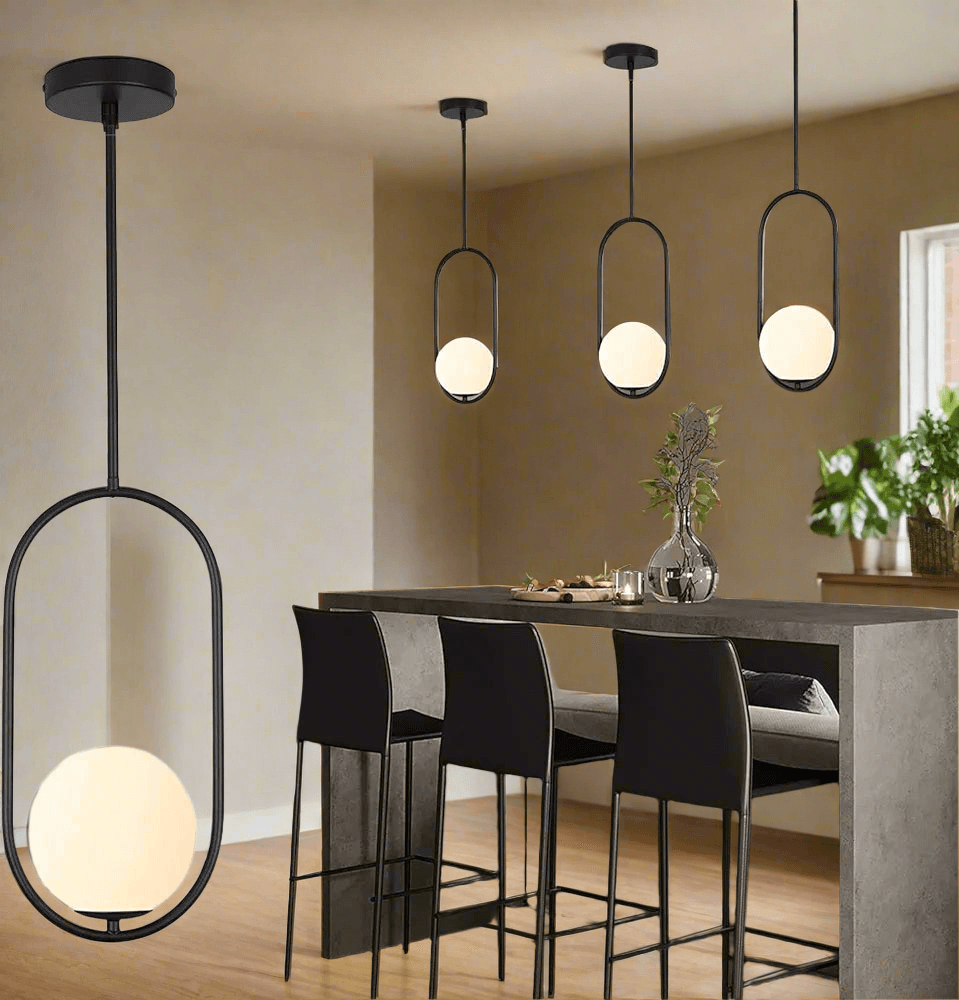 N I CREATIONS pendant light featuring four modern hanging fixtures with round shades in a stylish kitchen setting